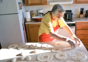 Rita making frybread
